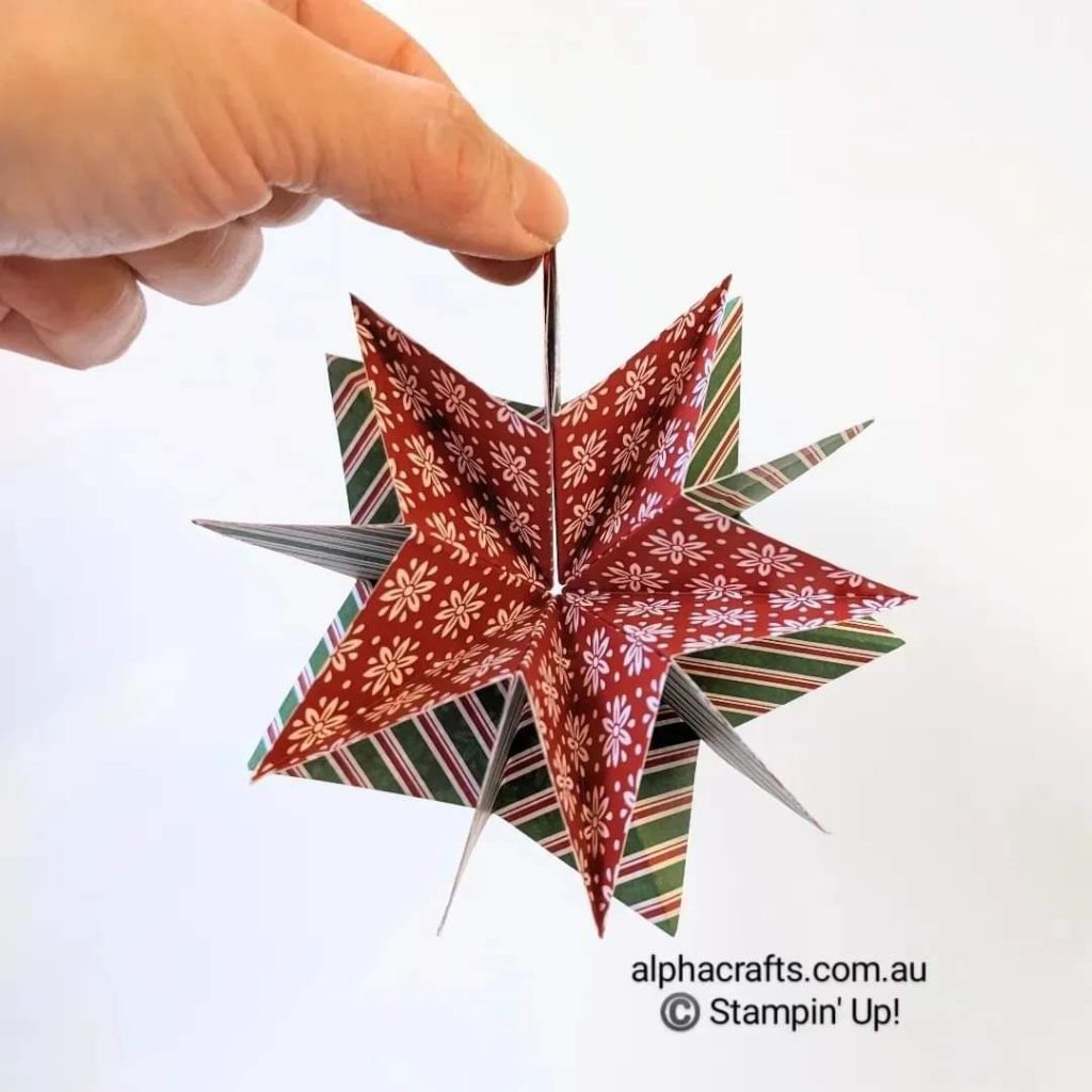 Star-shaped paper Christmas ornamnent